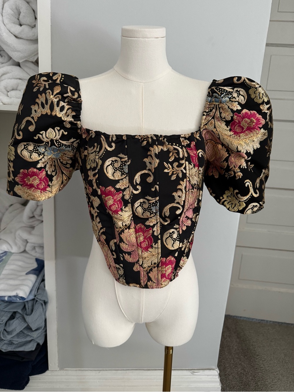 Baroque-Inspired Black Puff-Sleeve Corset Top with Gold and Pink Embroidery